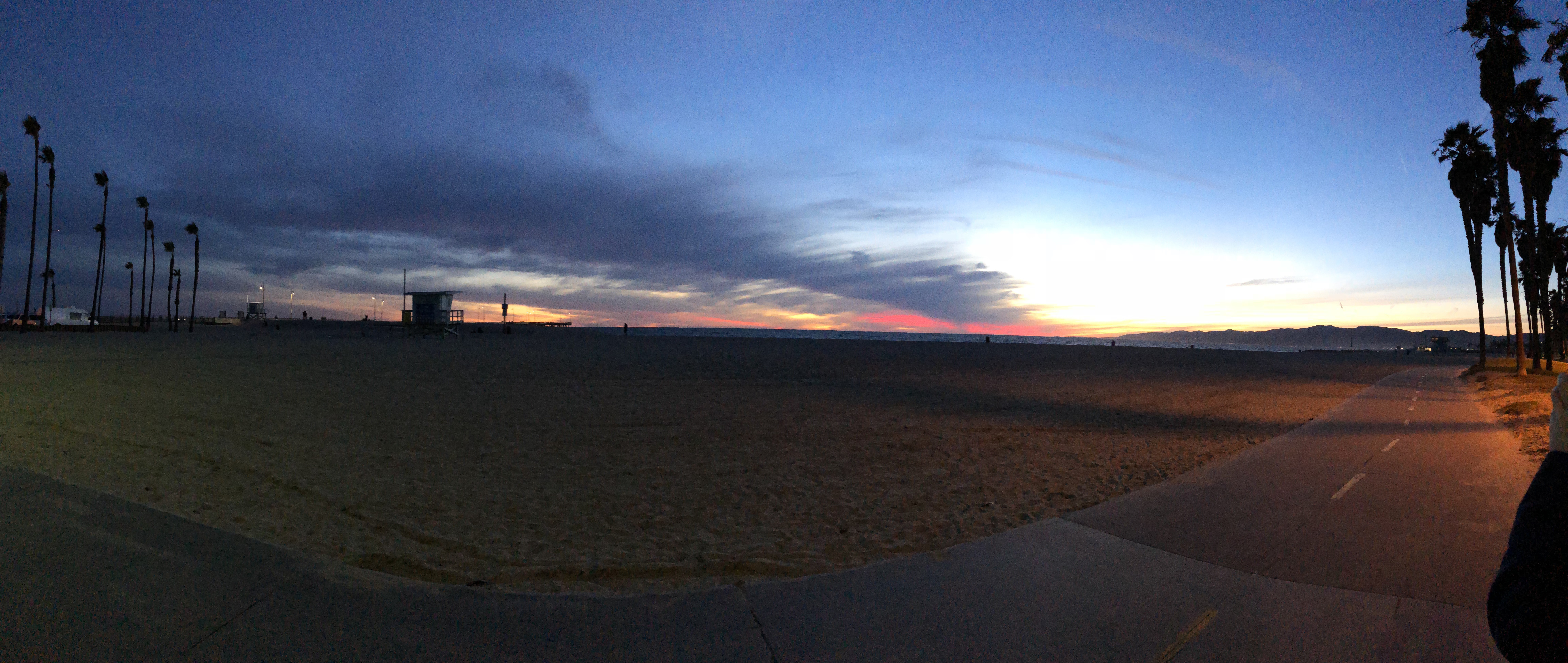 The sunset behind Venice Beach