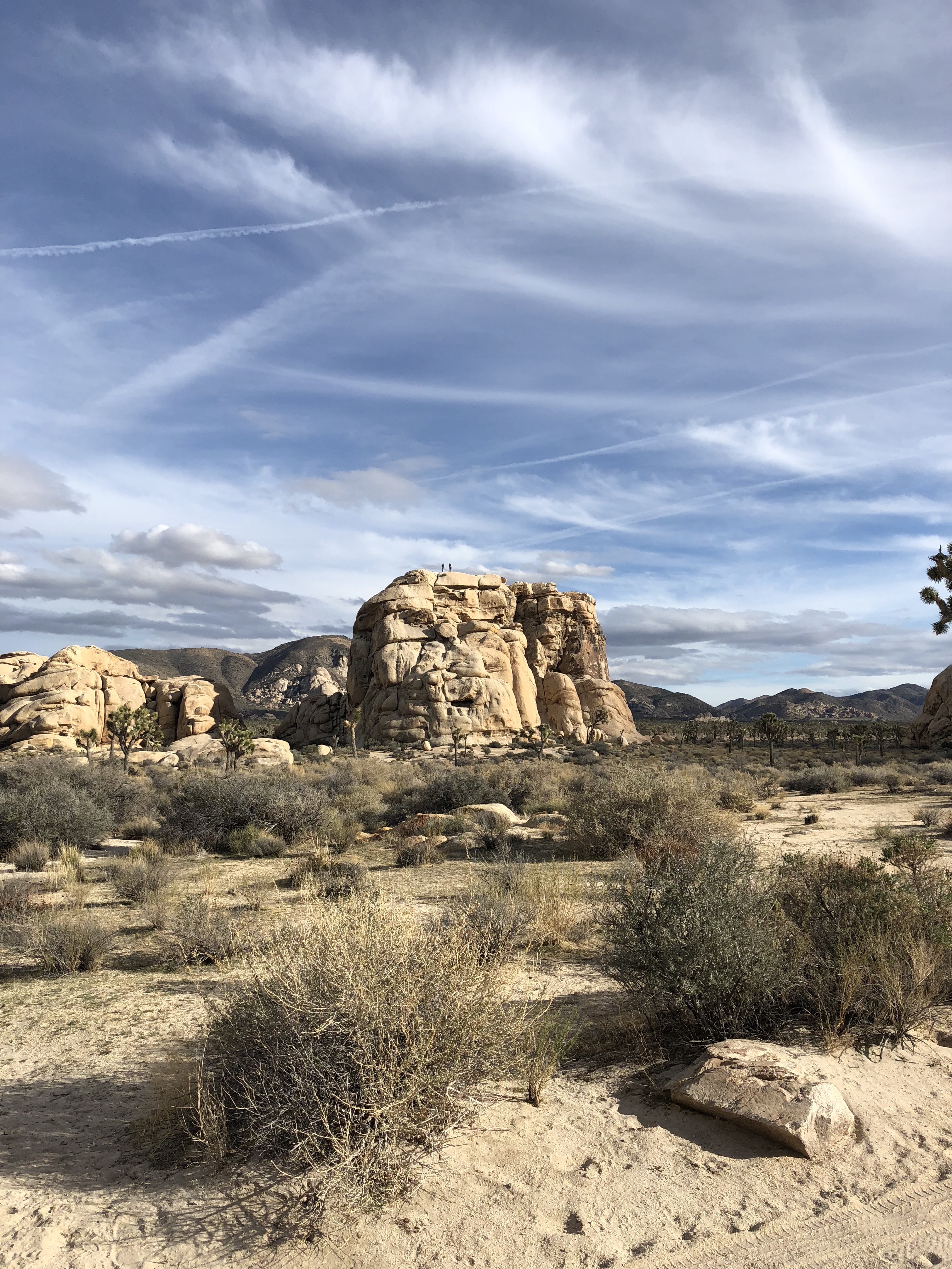 climbers at the top of Intersection Rock