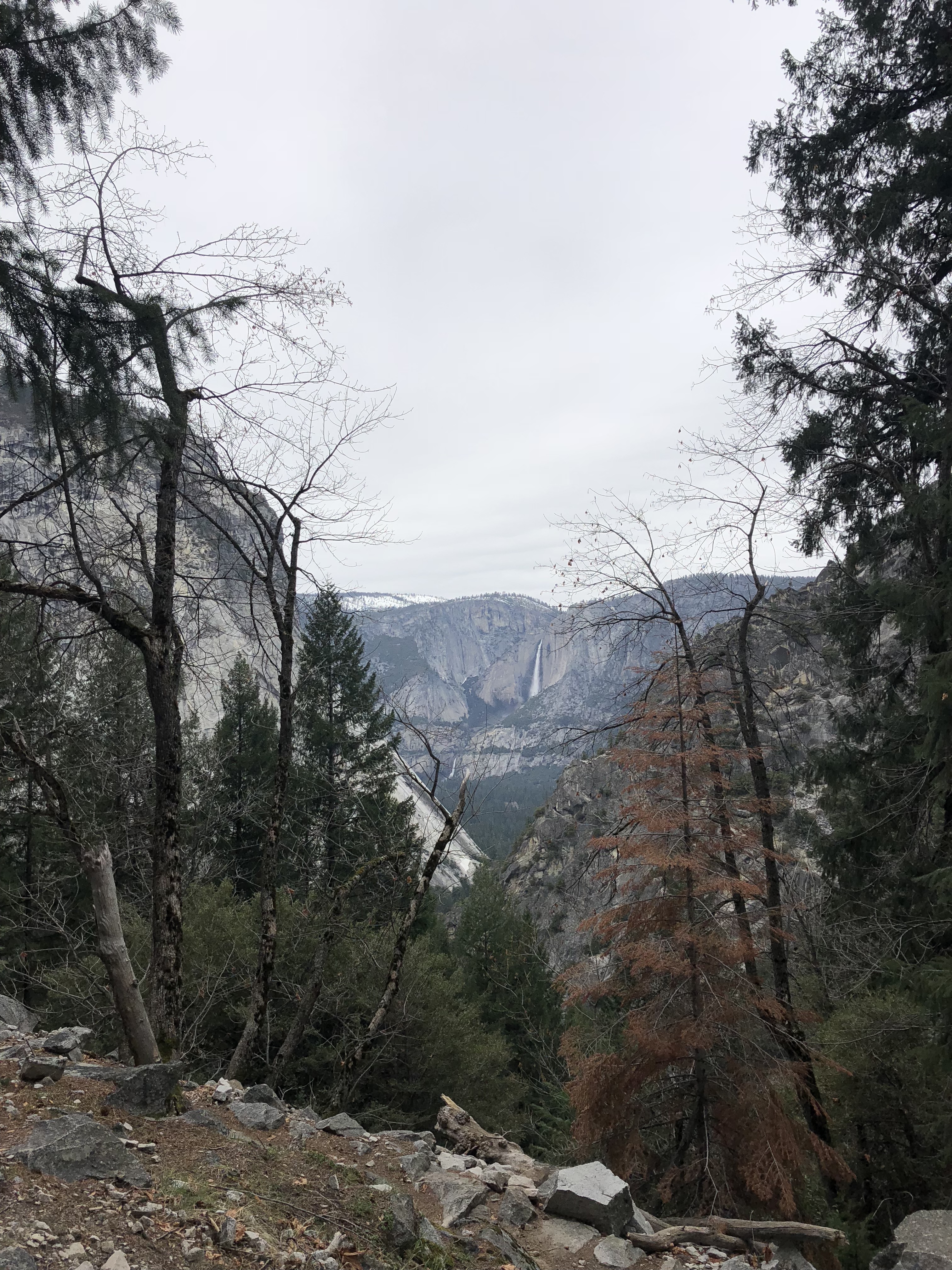 a view of a far-away waterfall in Yosemite National Park