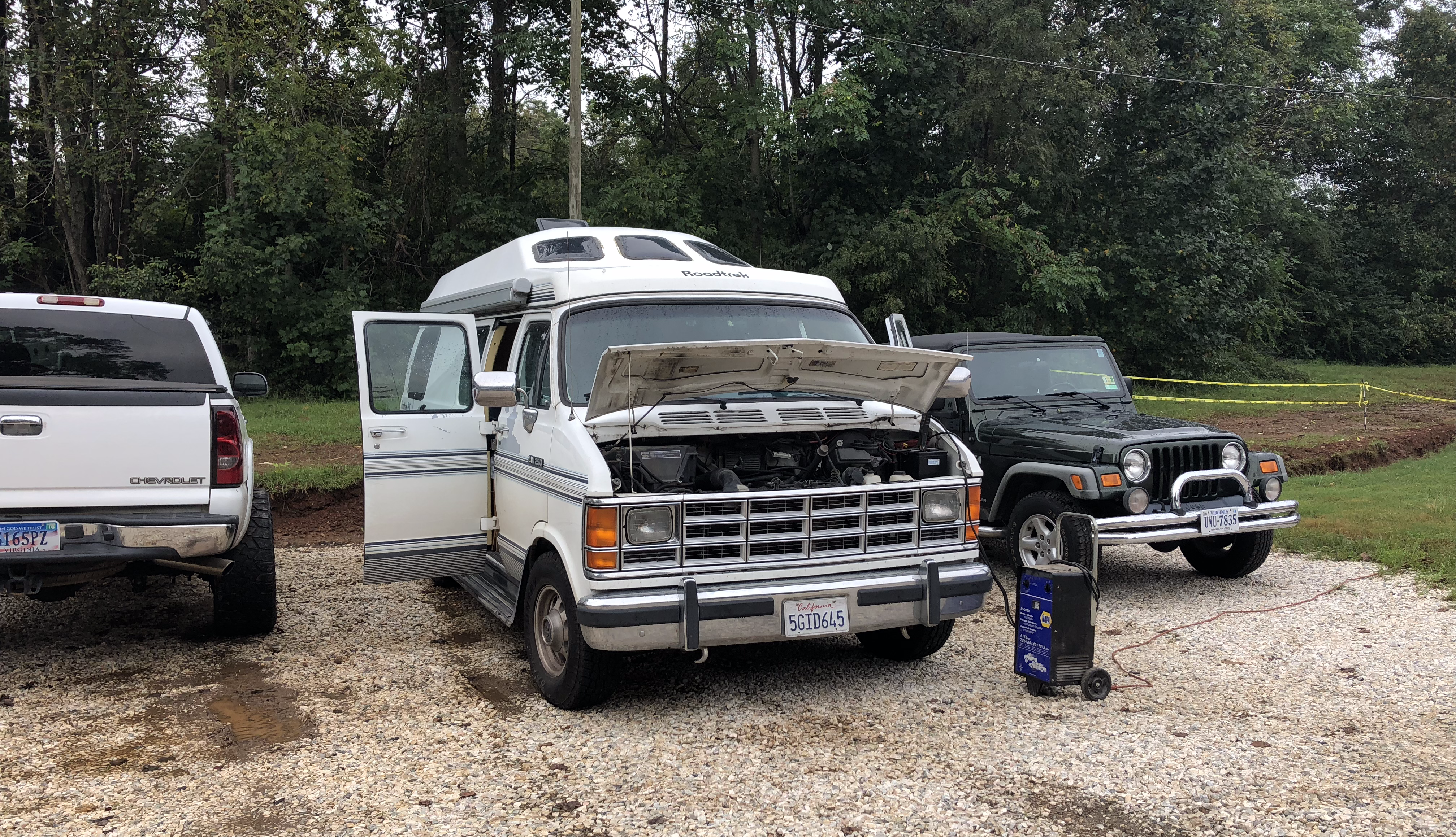 a Roadtrek with its hood open